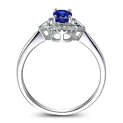 Bague en Argent 925 d'exception ornée d'une zircone bleue ovale et de cœurs