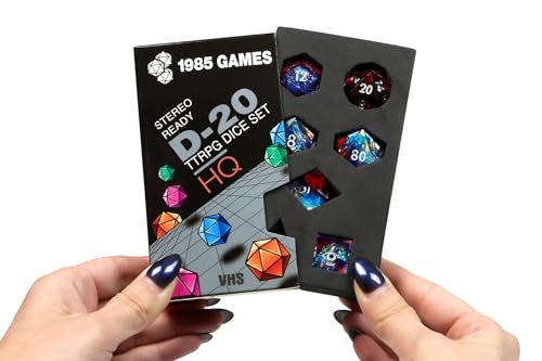 Image of 1985 Games Sharp Edge DND Dice Set - Plasmic Punch Polyhedral Dice in Retro VHS Box - TTRPG Dice Set - Tabletop RPG Accessory (Set of 7)