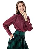 Der gerüschte Stehkragen verleiht unserer Bluse eine raffinierte und feminine Note, die Sie für jeden Anlass strahlen lässt. Dank des Knopfverschlusses am Hals ist unsere Bluse bequem anzuziehen und verleiht Ihnen einen schicken Look.
