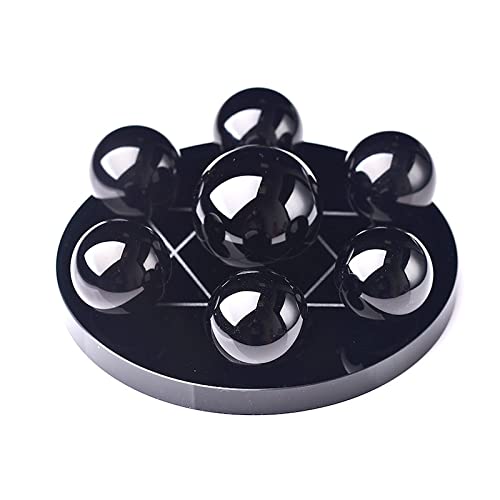 Obsidiana autentica en estructura de siete estrellas con esferas de cuarzo pulido