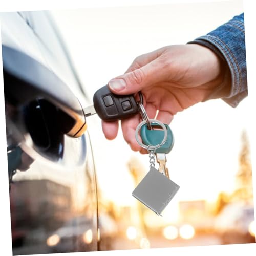 Cinta métrica mini retráctil 1 m con llavero miniatura 7