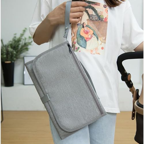 Bolsa para pañales con cambiador portátil y ganchos para un cochecito organizado 2