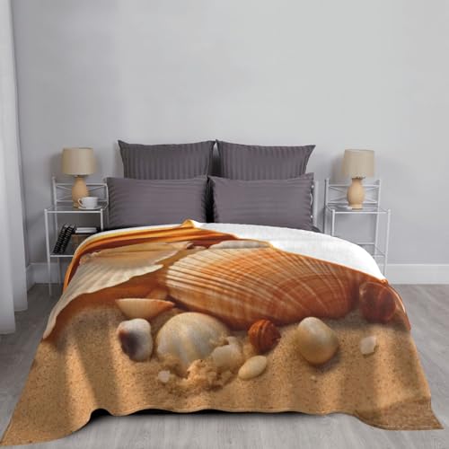 Couverture polaire coquillages légère contre le froid sur le canapé - 6