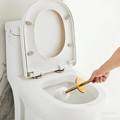 Support brosse WC or pour une décoration de toilettes chic