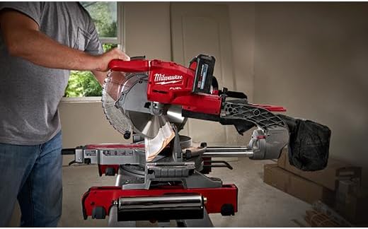 Milwaukee M18 FUEL Miter Saw being transported with side handles