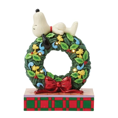 Enesco Peanuts by Jim Shore Snoopy Sleeping on Christmas Wreath Lit Figurine, 7.13 Inch, Multicolor