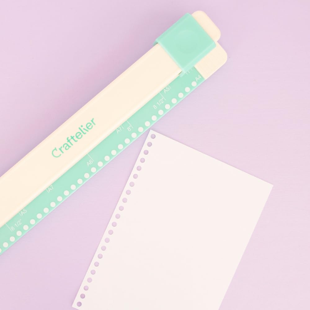 Craftelier - Encuadernadora Manual de 30 Agujeros - Perforadora con 6 Anillas Tonos Blanco y Negro - Perfora hasta 5 Hojas - Compatible con Tamaños de A4, A5, A6, A7 - Para Cuadernos y Scrapbooking