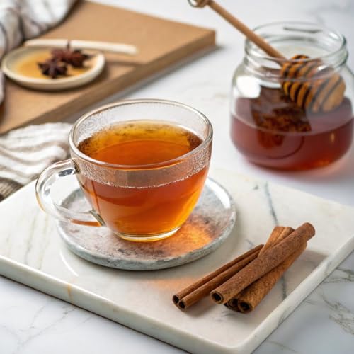Box of herbal tea with a warm cup prepared for a quiet evening ritual.