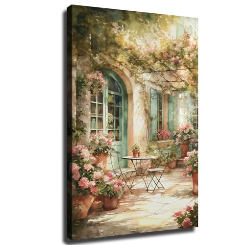 French Courtyard Garden Canvas Wall Art, Romantic Patio Scene with Flowers, Sunlight, and Bistro Chairs for Rustic Country Home Décor (Framed,16×24 inch)