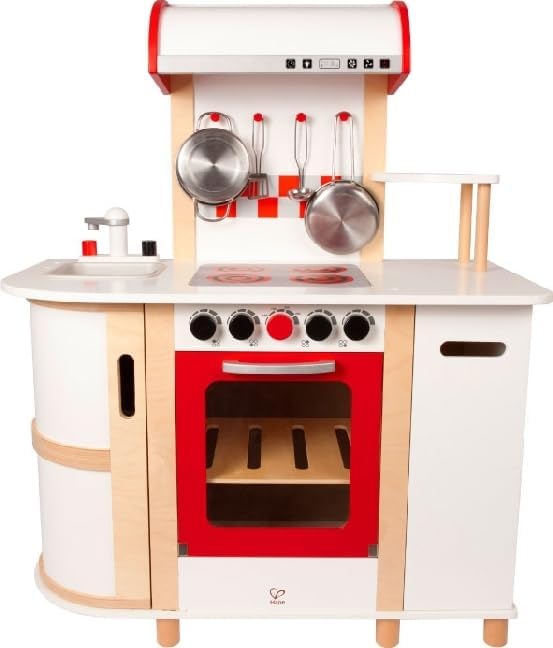 Quddiem view of the assembled Hape E8018 Multi-Function Kitchen, showing the red oven door, stove top, sink, and side storage.