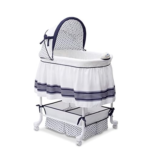 Delta Children Smooth Glide Bedside Bassinet - Portable Crib with Lights, Sounds and Vibrations, Marina