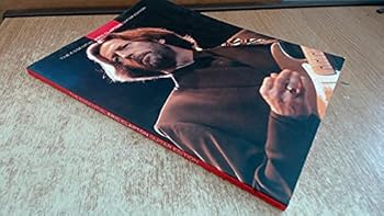 Paperback The Essential Eric Clapton Book