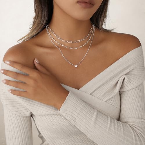 Collier en or superposé avec pendentif cœur le cadeau tendance idéal