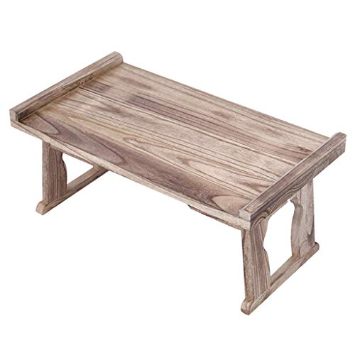 Table compacte avec pieds pliants pour optimiser les petits salons