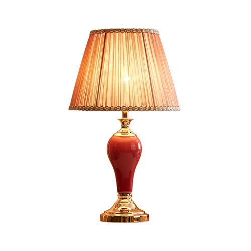 Lampe de bureau rouge en céramique pour illuminer votre coin lecture