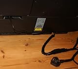 Stecker in den AUX- oder Line IN DIN-Buchse an der Rückseite des Geräts