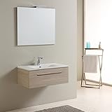 Bain mobile 80 cm avec un tiroir de verrouillage ralenti et la poignée en métal chromé, lavabo en premier moule céramique de qualité avec une profondeur de 13,50 cm, un miroir bord poli de 80 cm de large et 70 cm de hauteur. La conception est soigneusement étudié pour mieux utiliser l'espace et offrent une capacité de stockage maximale pour les articles de bain. La finition est en lion orme et rend cette salle de bains moderne mobile. Un design actualisé est facilement adapté aux