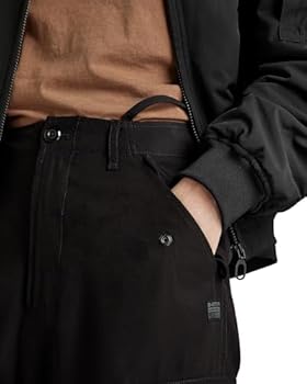 De cargo-broek is de populairste broek van nu en zo draag je hem De cargo-broek is de populairste broek van nu en zo draag je hem
