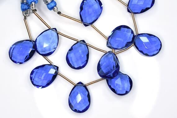 Quartz tanzanite poire 12x16mm appairé pour éviter les bijoux asymétriques