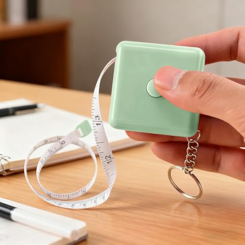 Cinta métrica retractil mini 1.5 m con llavero verde