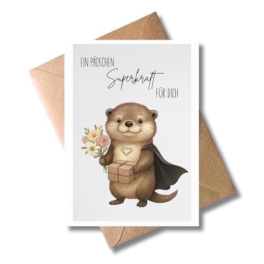 WBdesignz Gute Besserung Karte „Ein Päckchen Superkraft für dich“ mit Umschlag – Süße Aufmunterungskarte mit Superheld-Otter & Blumen - zur Genesung (DIN A6)