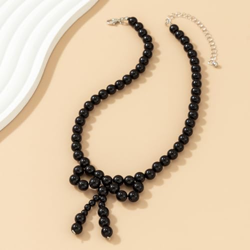 Collier perles blanches noires ajustable contre les fermoirs durs