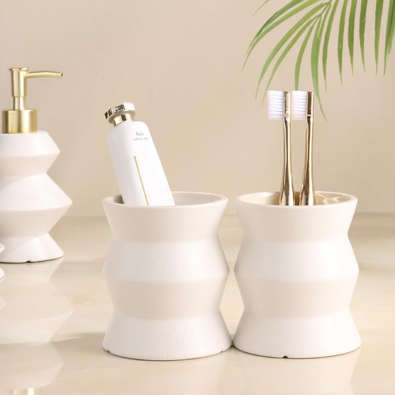 Ensemble d'accessoires de salle de bain 4 pièces avec motif marbre, comprend un porte-brosse à dents, un distributeur de savon, un porte-savon et des gobelets pour l'organisation du comptoir