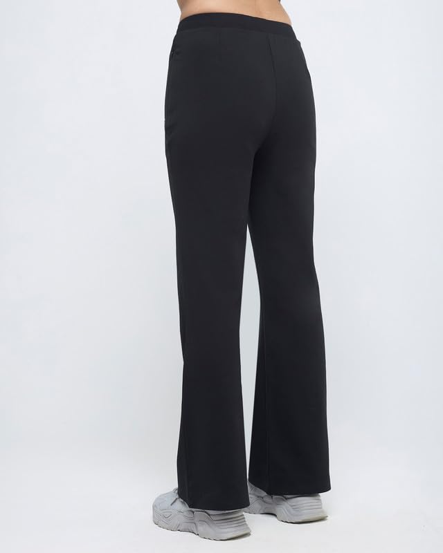 Image of HUNNIT Essential Flare Pants for Women with Zip Pockets | Mid Waist Solid Cotton Tapered Flare Pants | Bootcut Flared Trousers with Wide Elastic Waistband | Relaxed Fit Flared Trouser