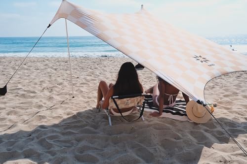 Image of Neso Portable Beach Tent Sun Shelter with Sand Anchor - Lightweight Beach Shade Canopy - Easy Setup for Family Outings - Patented Reinforced Corners - UPF 50+ Sun Protection - 7 x 7ft - Tan Checkers