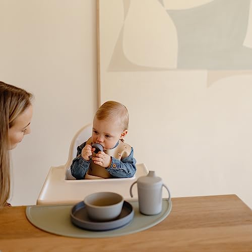 Image of mushie Silicone Baby Bib | Adjustable Fit Waterproof Bibs (Rocket Ship)