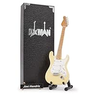 Size: 10in/25cm approx. JIMI HENDRIX’S MUSICAL LEGACY: Own a true piece of rock history with our Jimi Hendrix miniature guitar, faithfully modelled after his legendary instrument. Perfect for fans and collectors, this exquisite miniature guitar repli...
