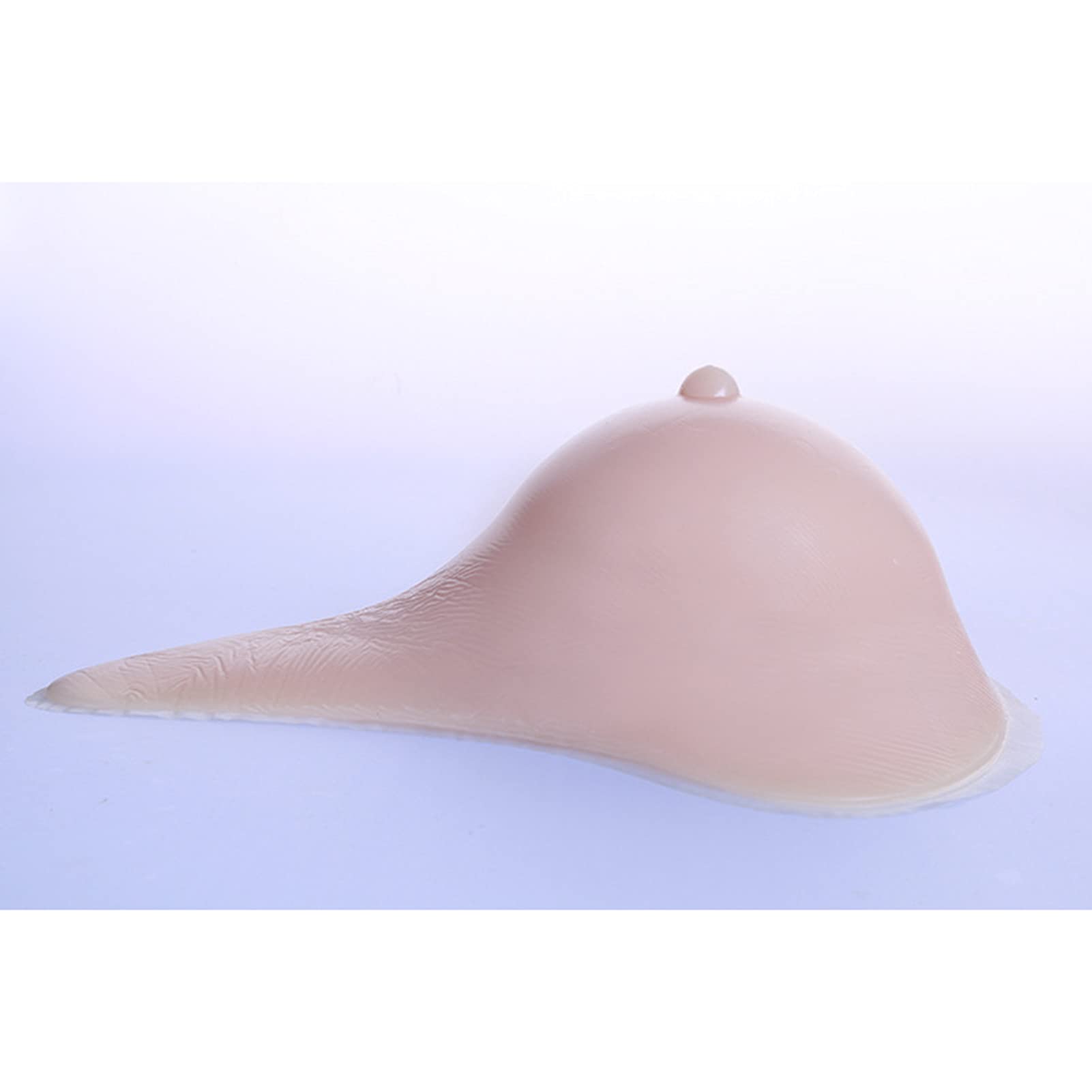 Le soutien-gorge insère des prothèses de seins, une fausse poitrine, une prothèse de poitrine de silicone étendue après la chirurgie, le coussinet de la poitrine, le