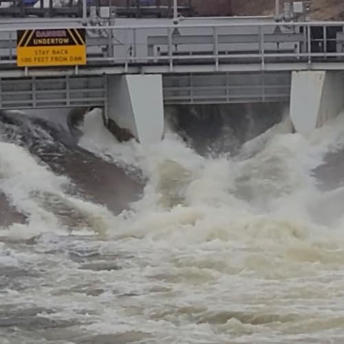 Rushing water, floating docks, debris, danger in Cheboygan due to flooding