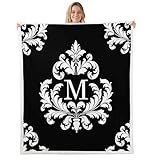 Doux et chaud : 100 % microfibre de polyester. Polaire réversible en flanelle imprimée super douce sur un côté, peluche super chaude en polyester sherpa à l'intérieur.