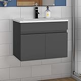 Meuble lavabo avec vasque en céramique blanche.