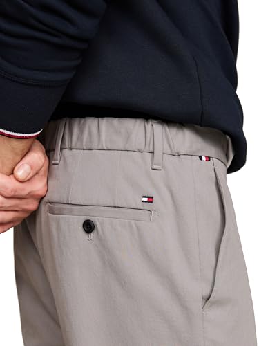 Image of Tommy Hilfiger Men's Casual Moisture Wicking Wrinkle Resistant Stretch Performance Pants in Straight Fit