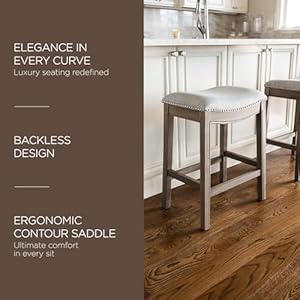 Maven Lane Adrien 26 Inch Counter Height Upholstered Backless Saddle Barstool in Reclaimed Oak Finish with Ash Grey Fabric Cushion Seat Maven Lane Adrien 26 Inch Counter Height Upholstered Backless Saddle Barstool in Reclaimed Oak Finish with Ash Grey Fabric Cushion Seat