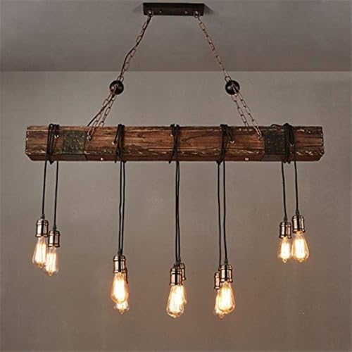 Lustre éclairage plafond restaurant et grand îlot en bois