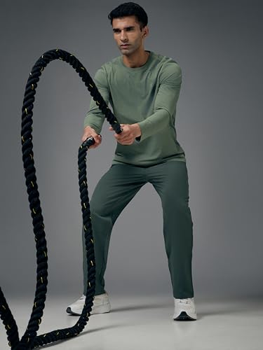 Image of TECHNOSPORT Mens Regular Fit Solid Woven Track Pant for Activewear, Regular Use and Quick Dry, (Non- Stretchable)