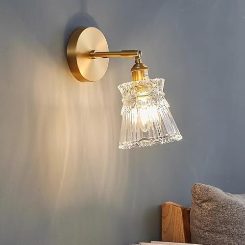 Applique rétro or antique ajustable pour optimiser l'éclairage de lit