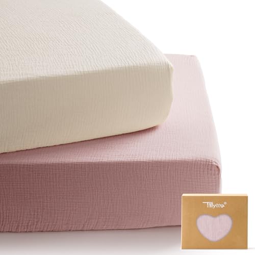 TILLYOU モスリンベビーベッドシーツ 男の子と女の子用 100%コットン フィットベビーベッドシーツ 幼児用52x28 標準ベビーベッドマットレス ピンクとアプリコット 2枚パックの商品画像（Amazon）