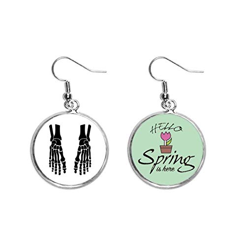 Pendientes de esqueleto negro con diseño de hueso de pie humano para primavera