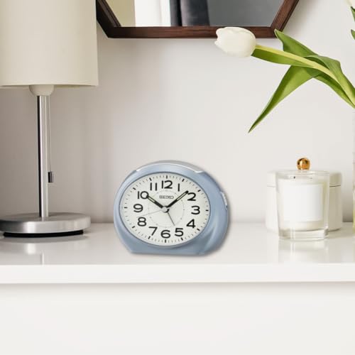 Image of Seiko Elegant Oval Blue Plastic Case White Dial Analog LumiBrite Alarm Table Clock (Size: 11.2 x 6.8 x 8.8 CM | Weight: 130 gram)