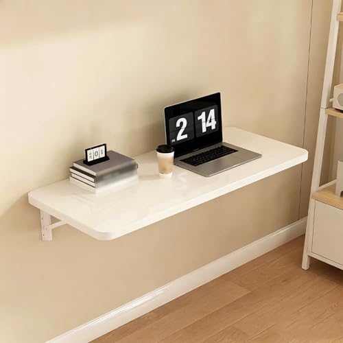 Table pliante murale pour optimiser le manque d'espace dans une chambre