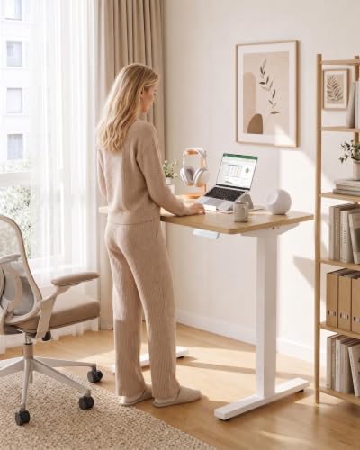 HUANUO 32x19 Inch Small Electric Standing Desk, Adjustable, Light Walnut - Image 2