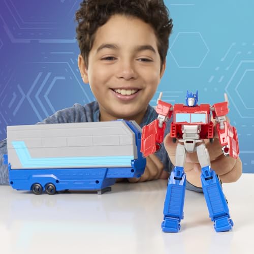 Image of Transformers EarthSpark Optimus Prime Battle Trailer Playset with Action Figure, Lights and Sounds, Electronic Truck Toys for Kids 6 and Up