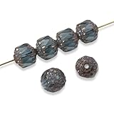 Immerse yourself in the elegance of our Czech glass beads, where old-world charm meets contemporary artistry. This set of 12 Montana blue cathedral beads, each 8mm in size, is a masterpiece of faceted beauty enhanced by subtle bronze-washed ends. The...