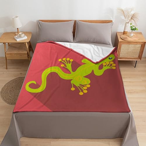 Couverture polaire gecko vert pour réchauffer vos soirées cocooning
