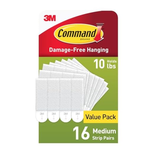 Command Picture Hanging Strips, Medium, White, Holds up to 12 lbs., 16-Pairs (32-Strips), Easy to Open Packaging