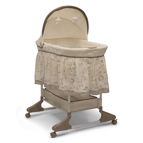 Delta Children Portable Rocking Bassinet...